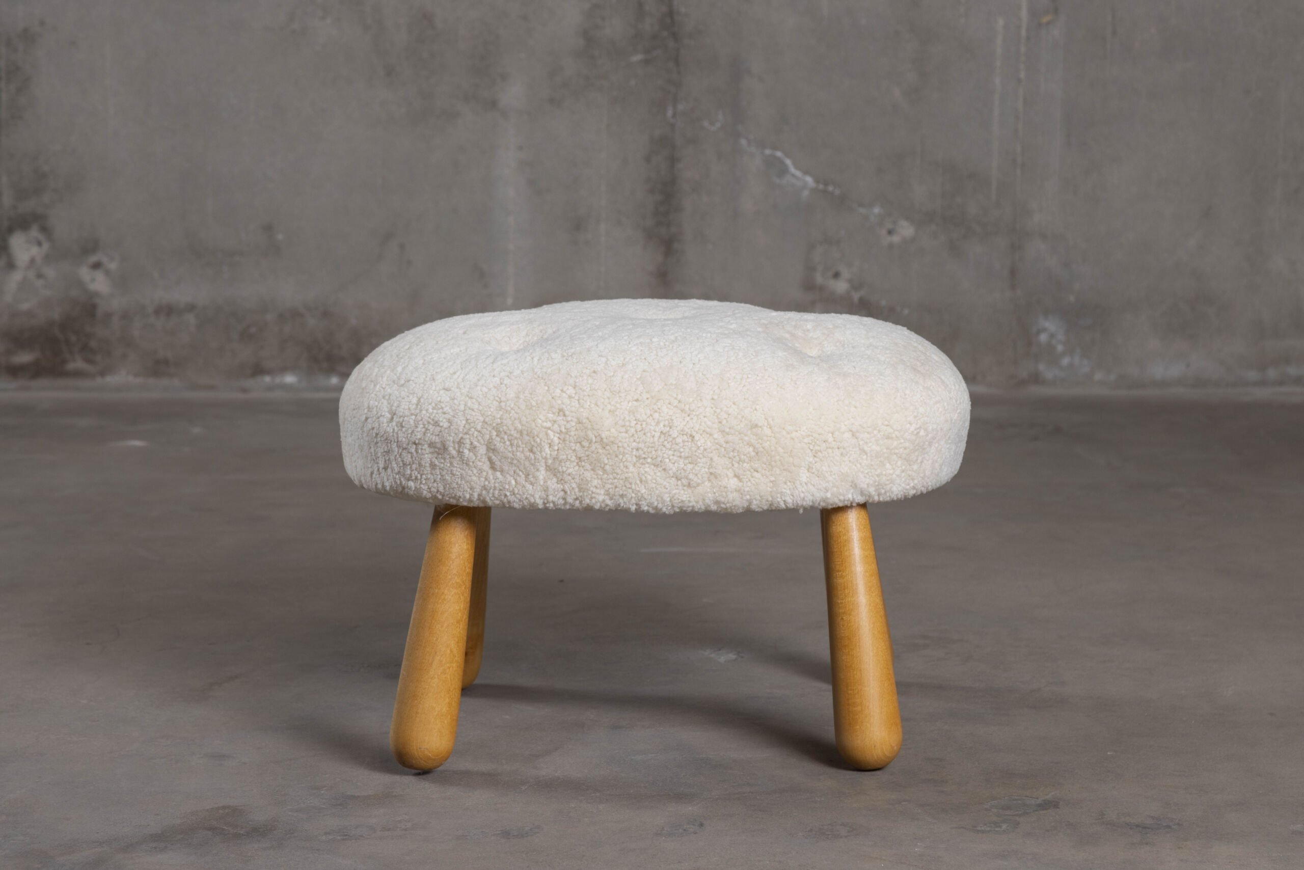 SHEEPSKIN UPHOLSTERED OTTOMAN - JF Chen